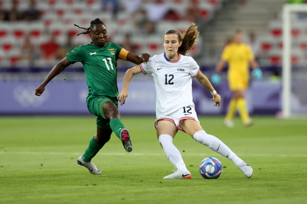 ierna Davidson (right) of the U.S. Women's National Team is challenged by Barbra Banda of Zambia during a group match between the U.S. and Zambia during the Paris Olympics at Stade de Nice on Thursday in Nice, France.