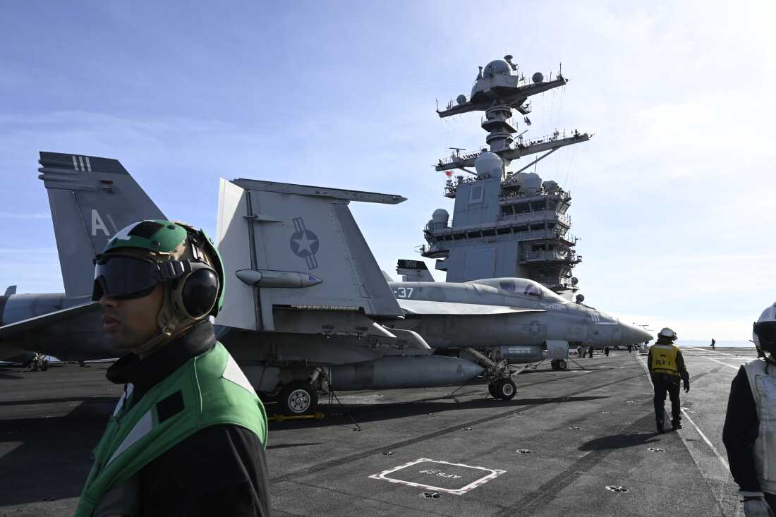 An F-18E fighter jet is seen on the USS Gerald R. Ford aircraft carrier in September in the North Sea.