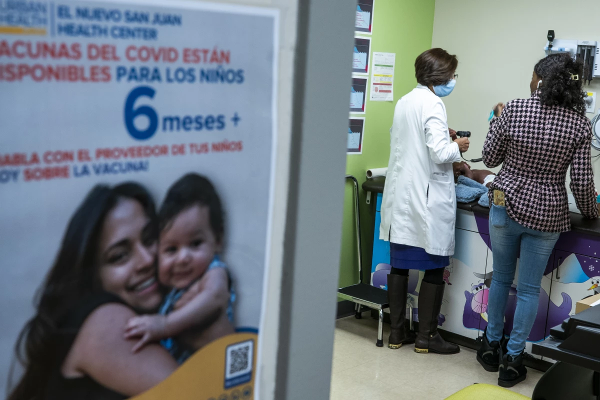 Dr. Acklema Mohammad checks a patient at El Nuevo San Juan Health Center in the Bronx in New York City in 2024. Community health clinics, like this one, are often located in immigrant communities and rely on Medicaid.