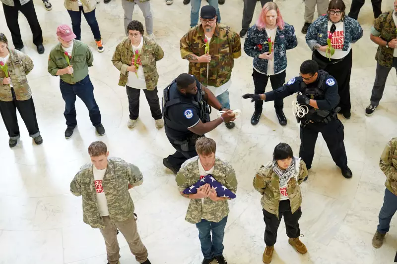 Veterans, military family members, and supporters at a demonstration in the Cannon House Office Building on April 20.