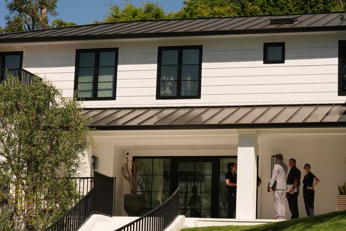 Prosecutor says Rihanna, family were home when woman charged with attempted murder fired