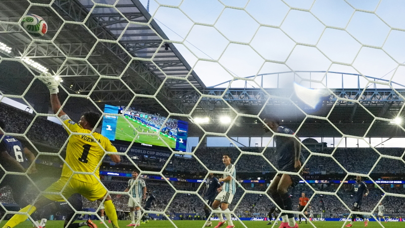 Cape Verde goalkeeper Vozinha (1) is scored on by Argentina's Lisandro Martinez during the World Cup round of 32 soccer match between Argentina and Cape Verde in Miami Gardens, Fla., Friday, July 3, 2026.