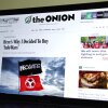 The Onion website is displayed connected a machine screen, showing a satirical communicative titled Here’s Why I Decided To Buy ‘InfoWars’, connected November 14, 2024, successful Pasadena, California.