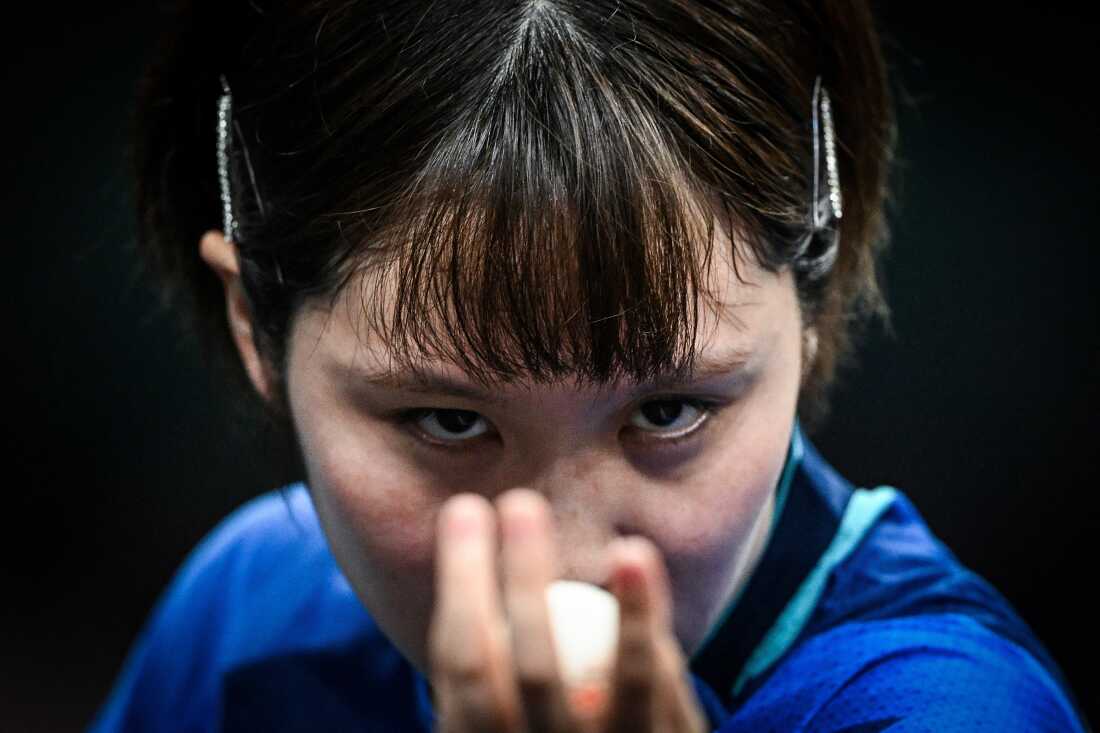 Japan's Miu Hirano eyes the ball as she prepares to serve to India's Manika Batra during their women's table tennis singles round of 16 at the Paris 2024 Olympic Games at the South Paris Arena in Paris on Wednesday.