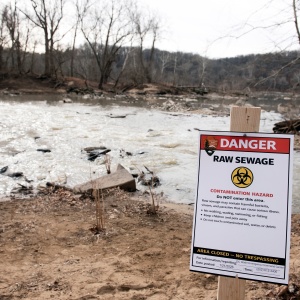 A warning sign was placed in January at the site of a massive pipe rupture, as sewage flowed into the Potomac River in Glen Echo, Md.