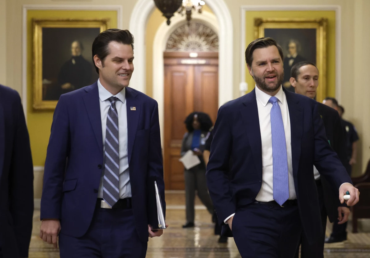Former U.S. Rep. Matt Gaetz, who President-elect Donald Trump had nominated to be attorney general, walks alongside Vice President-elect JD Vance as they arrive for meetings with senators at the U.S. Capitol on Nov. 20, 2024 in Washington, DC.