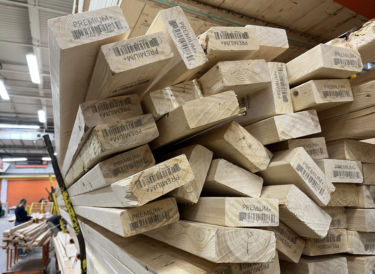Piles of lumber are seen for sale at a home improvement store in Falls Church, Va., on Monday. The U.S. has become somewhat less reliant on Canadian softwood lumber in recent years, but tariffs could still cause building costs to rise.