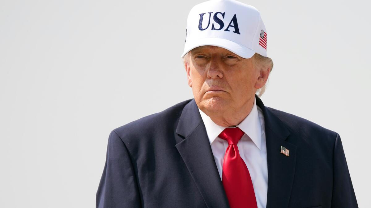 President Trump walks to board Air Force One as he departs Bismarck Municipal Airport on July 1, 2026, in Bismarck, North Dakota. Trump traveled to North Dakota to attend the Theodore Roosevelt Presidential Library dedication.