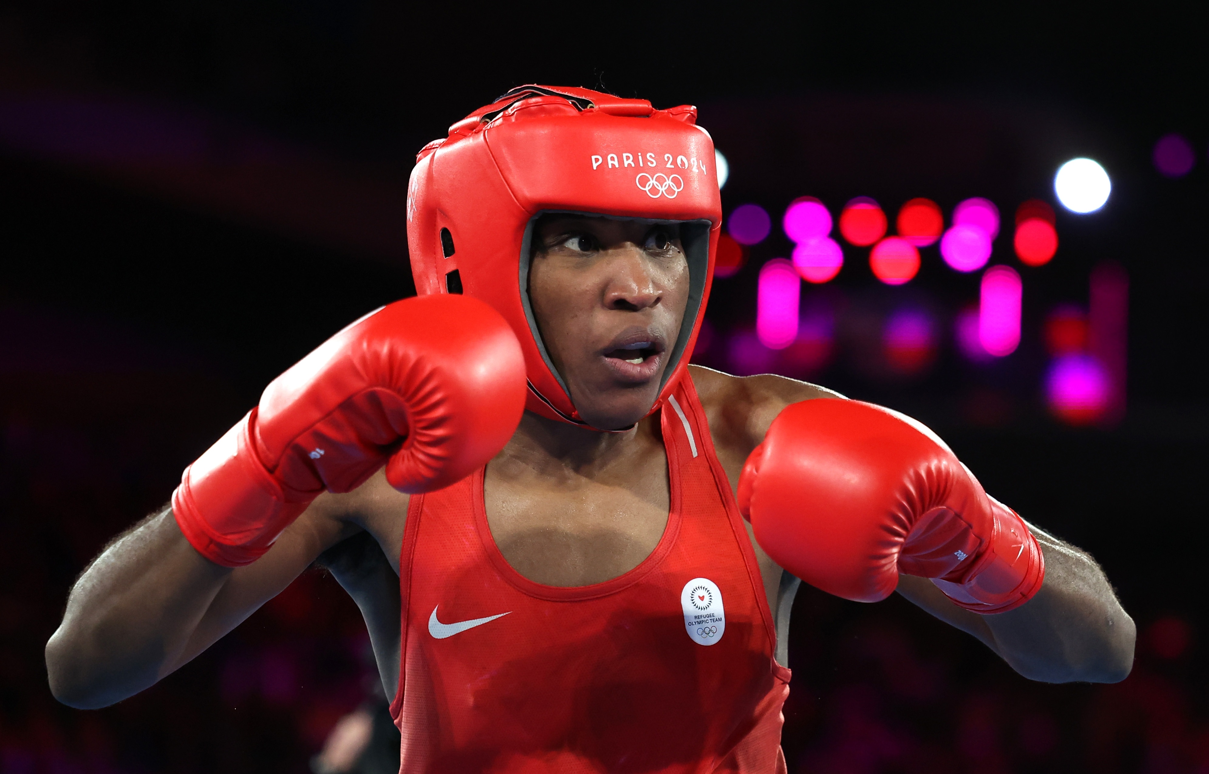 The Refugee Olympic Team wins its first-ever medal, thanks to boxer Cindy Ngamba The Refugee Olympic Team wins its first-ever medal, thanks to boxer Cindy Ngamba