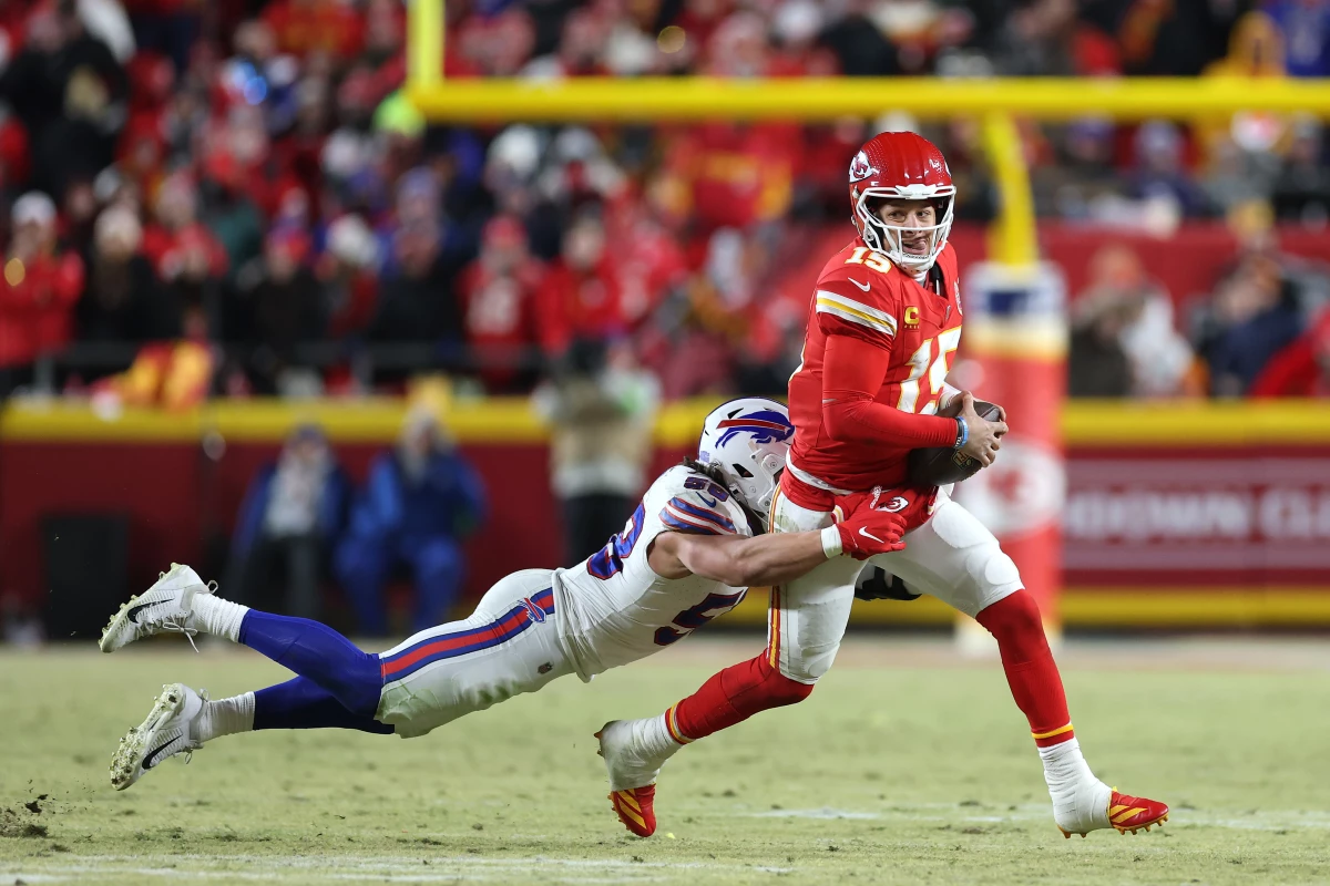 Patrick Mahomes of the Kansas City Chiefs is sacked by Matt Milano of the Buffalo Bills during the third quarter in the AFC Championship Game at GEHA Field at Arrowhead Stadium on Jan. 26 in Kansas City, Missouri.