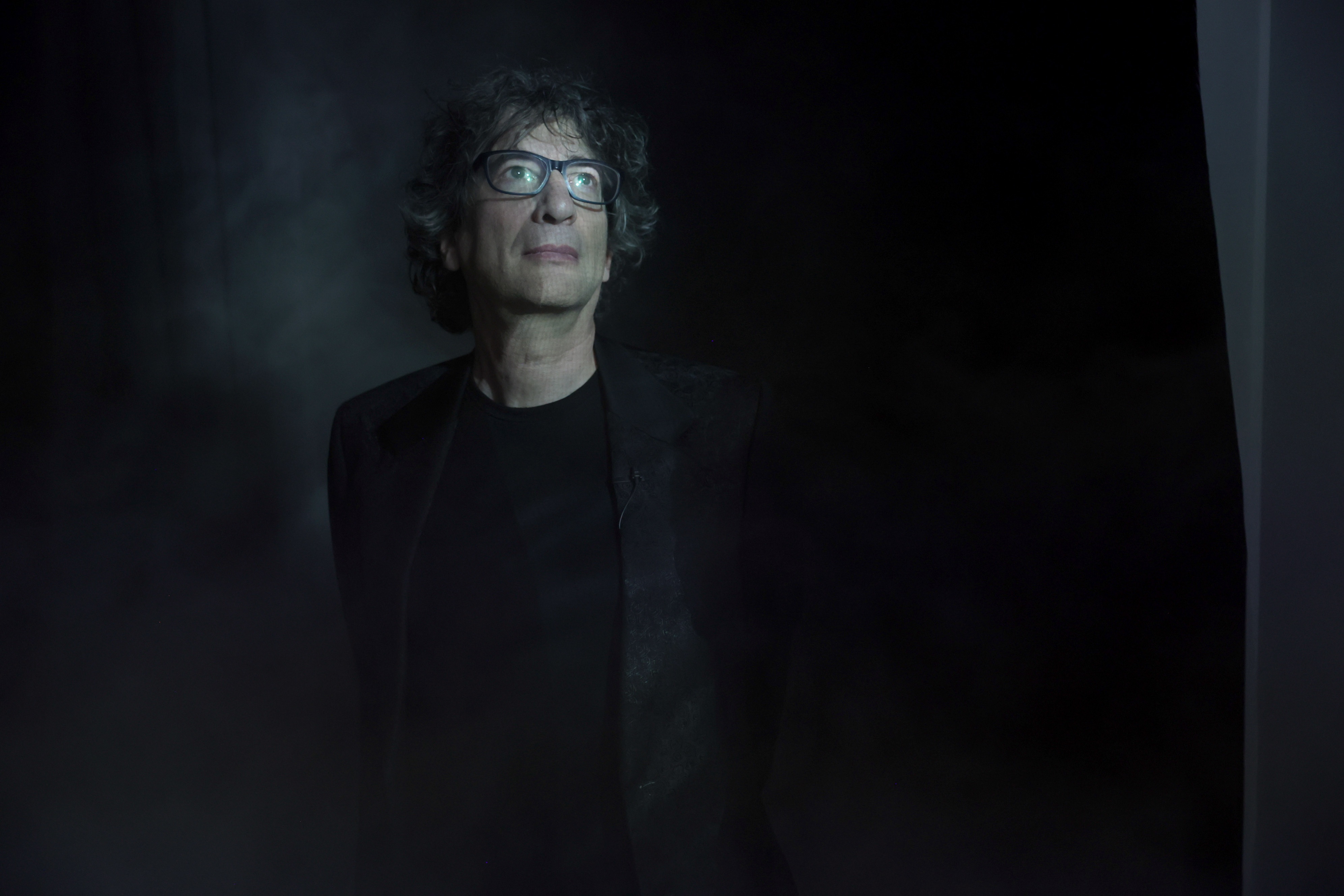 Author Neil Gaiman at an event for Audible celebrating <em>The Sandman: Act III</em> in 2022.