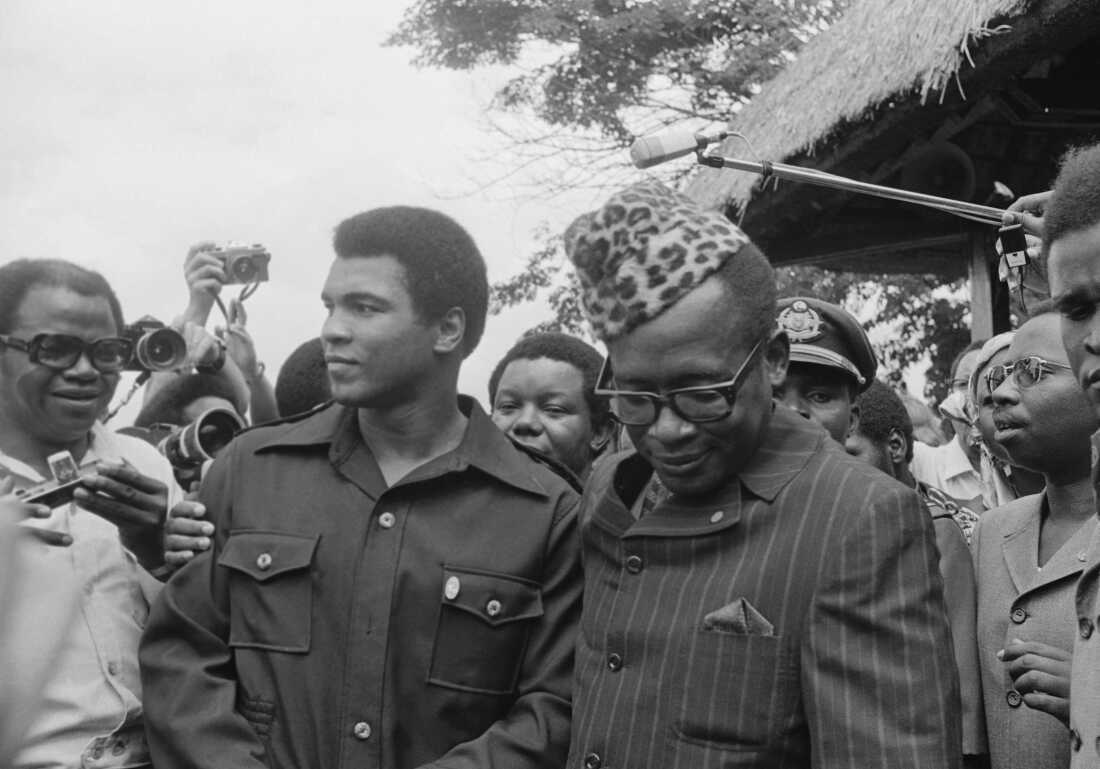 Zaire President Mobuto with heavyweight challenger Muhammed Ali during a stroll around the gardens of the presidential palace here Oct. 28th 1974.