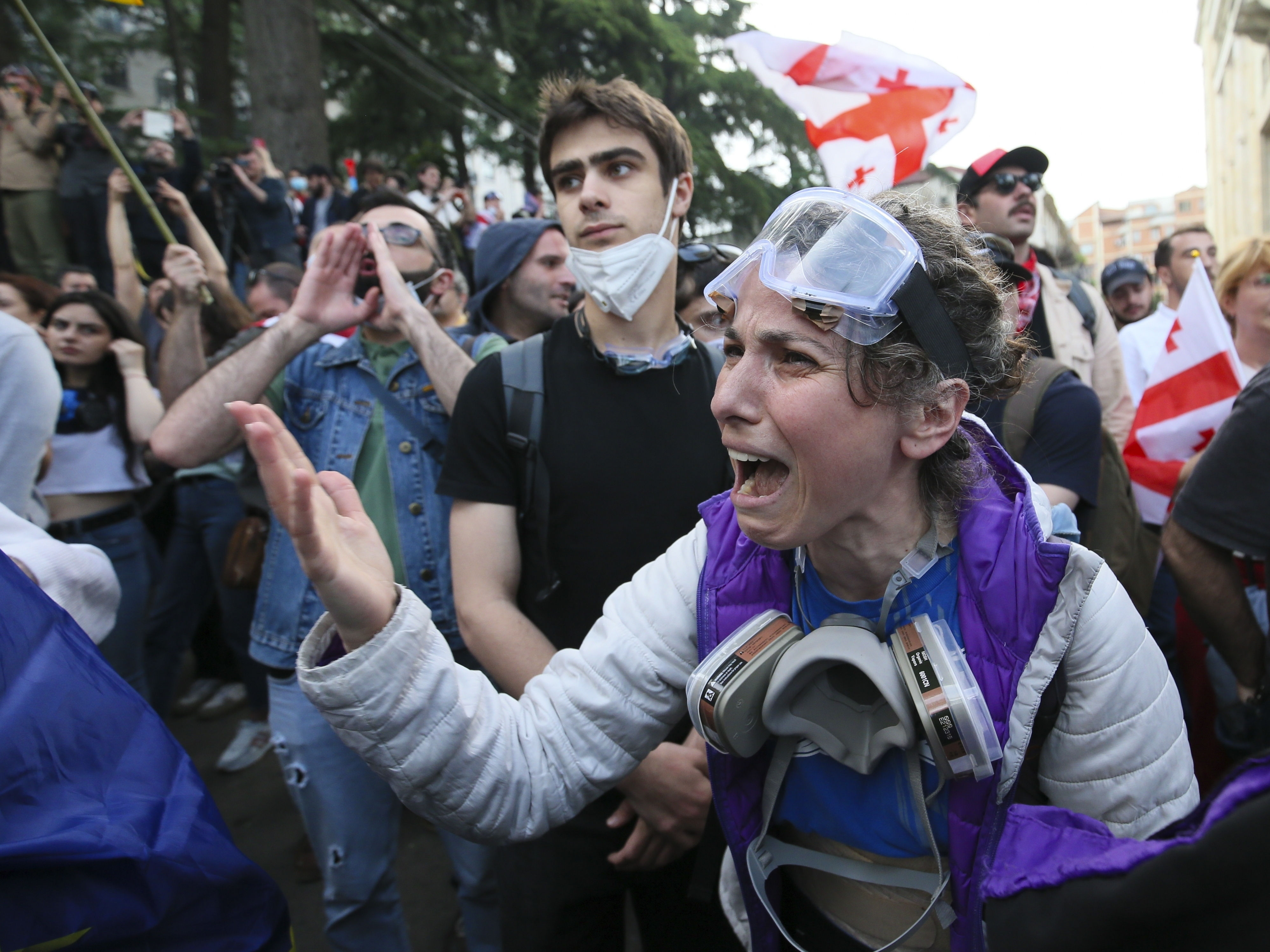 A demonstrator argues with police officers during a protest against the foreign influence bill at the Parliamentary building in Tbilisi, Georgia, on Tuesday, May 28, 2024. The Georgian parliament has overridden a presidential veto of the "foreign agents" legislation that has fueled Western concerns and sparked massive protests for weeks.
