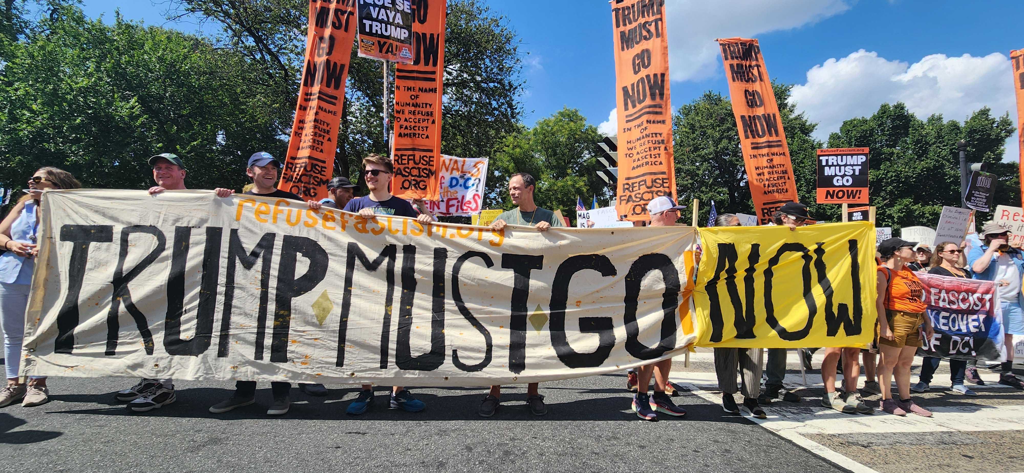 Hundreds of protesters march to White House on Aug. 16, 2025. (NPR)