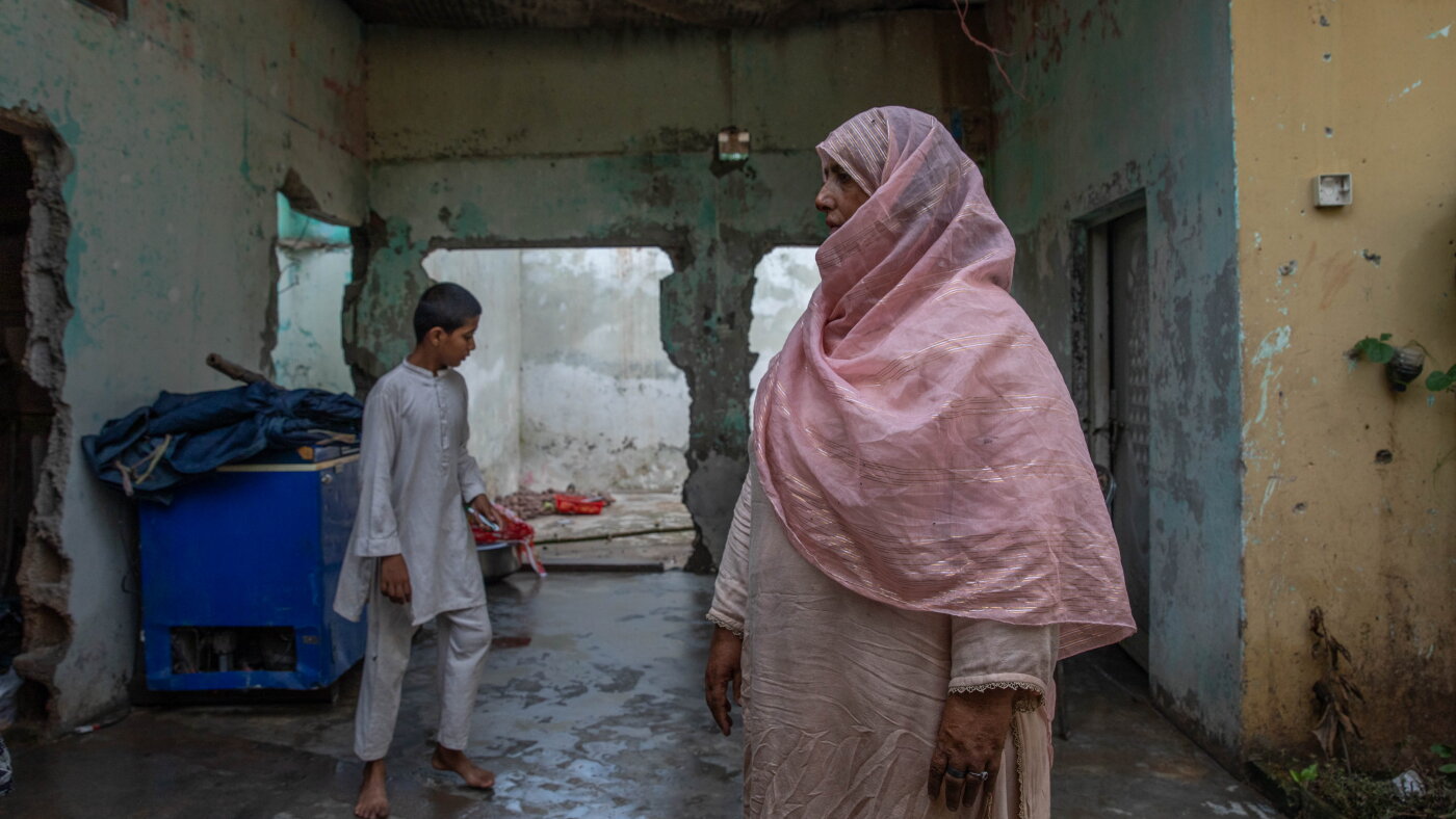 They live by a shrine to a saint. Why are their homes being demolished?