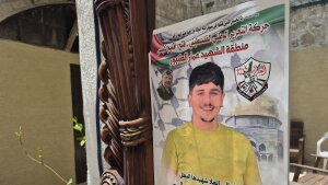 A poster announces the death of Nayef Samaro, 25, after he was killed during an Israeli military raid on Nablus in May.