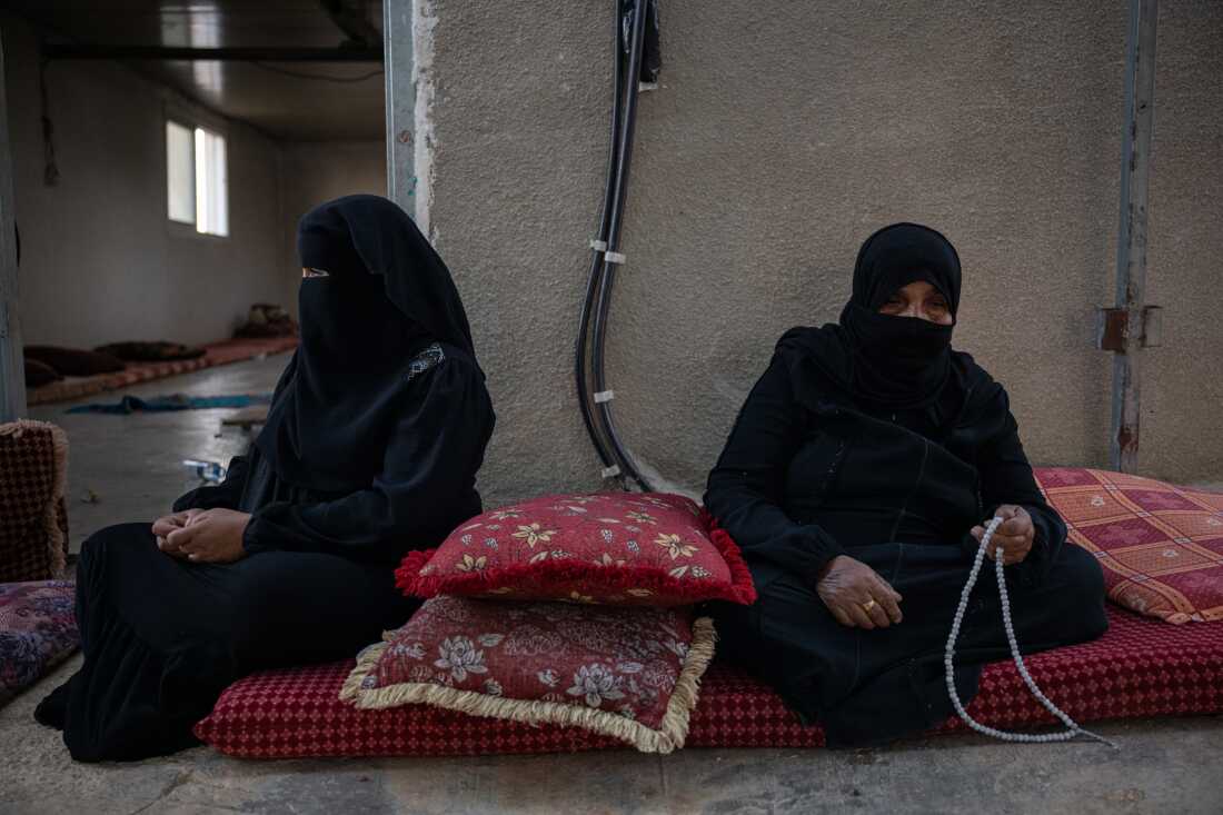 (Right) Khadra Hathaleen, mother of Palestinian activist Awdah Hathaleen, is joined by other women from the village of Umm al-Kheir, most of whom are on hunger strike, as they mourn his death, on Aug. 4, 2025 in Umm al-Kheir, West Bank.