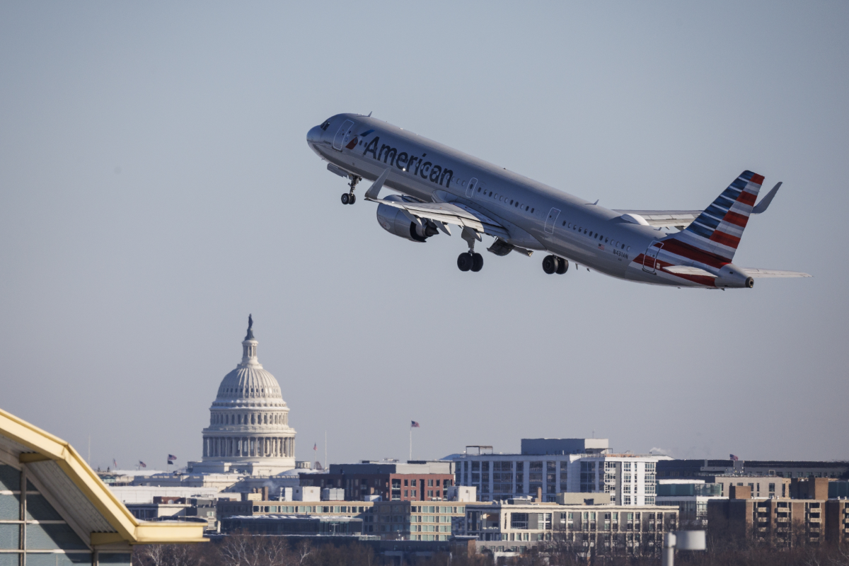 An American Airlines jet takes off from the Ronald Reagan Washington National Airport on January 29, 2026, on the first anniversary of the day 67 people died after a U.S. Army Black Hawk helicopter collided with a commuter jet over the Potomac River.