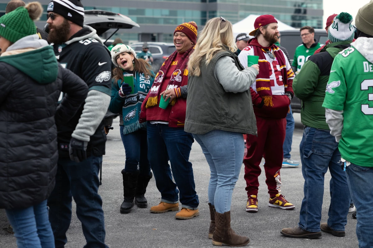 Philadelphia Eagles and Washington Commanders fans tailgate ahead of the NFC championship game which would send the Eagles to the Super Bowl.