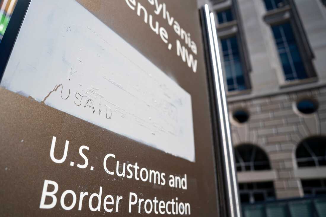 "USAID" etched onto a covering where signage used to be at the US Agency for International Development (USAID) headquarters in Washington, DC, US, on Monday, March 10, 2025. A US judge ordered the Trump administration to undo some of its cuts to billions of dollars in foreign assistance programs through the US Agency for International Development, the latest turn in a legal fight that's likely to end up at the US Supreme Court.