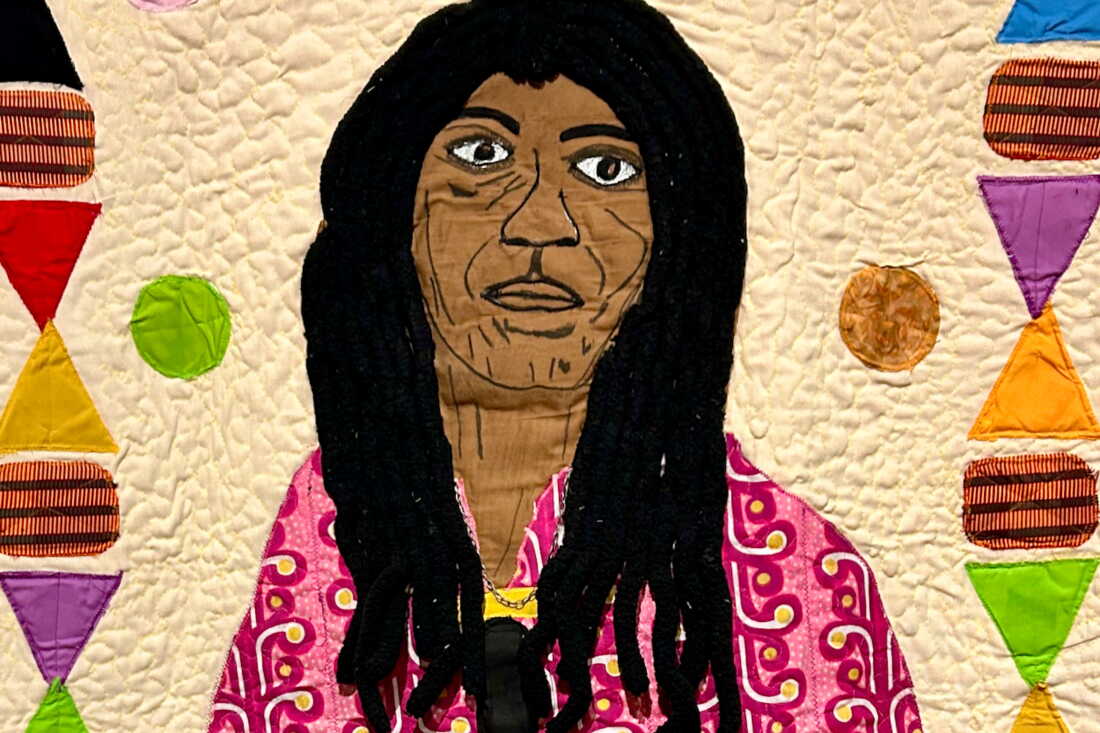 Tyler uses applique, yarn, jewelry, charcoal and other mixed media to emphasize the humanity of the people still serving long sentences at Angola and other prisons, as this detail of "Enduring" (2025) shows.