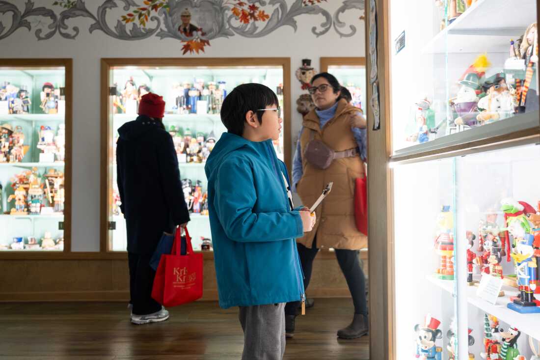 Theo Jung, 9, makes his way down a nutcracker scavenger hunt checklist put together by the museum.