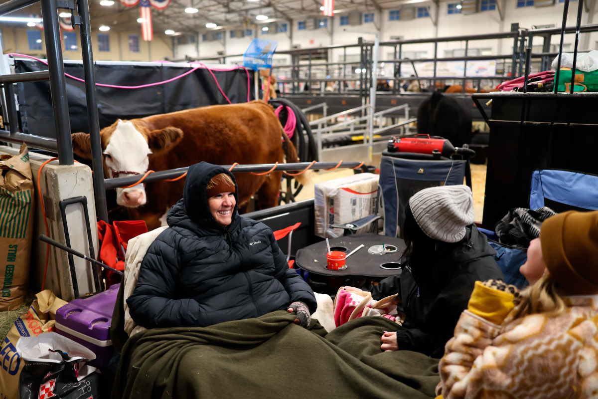 Workers are bundled up at the Fort Worth Stock Show & Rodeo ahead of an anticipated winter storm in Fort Worth, Texas.