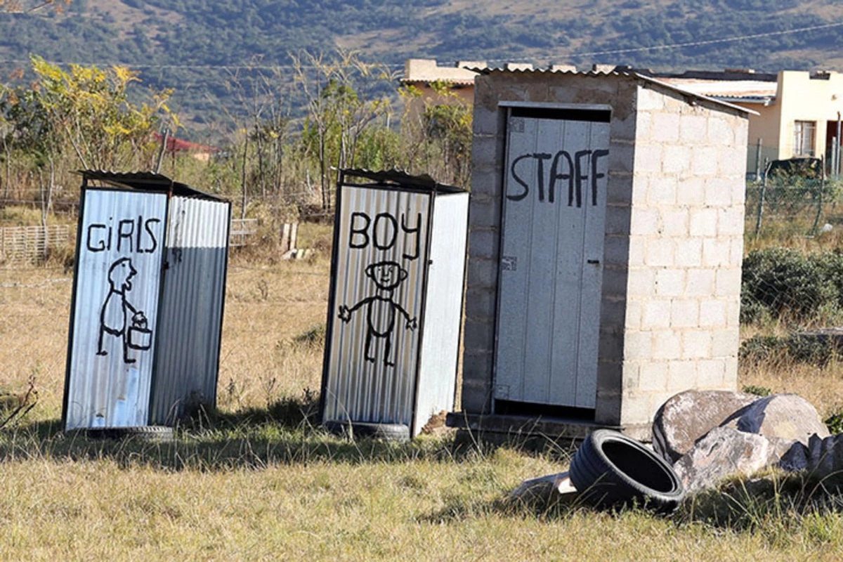 Makeshift toilets are a common scene along the roads of South Africa's Eastern Cape, like this set at a school in Mathanga village.