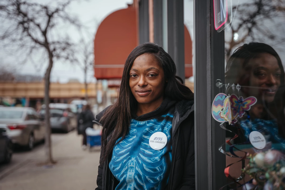Seara Clayborn, a union member, stands for a portrait in downtown Evanston. She's voted for Schakowsky since she was 18 and is now backing Biss.