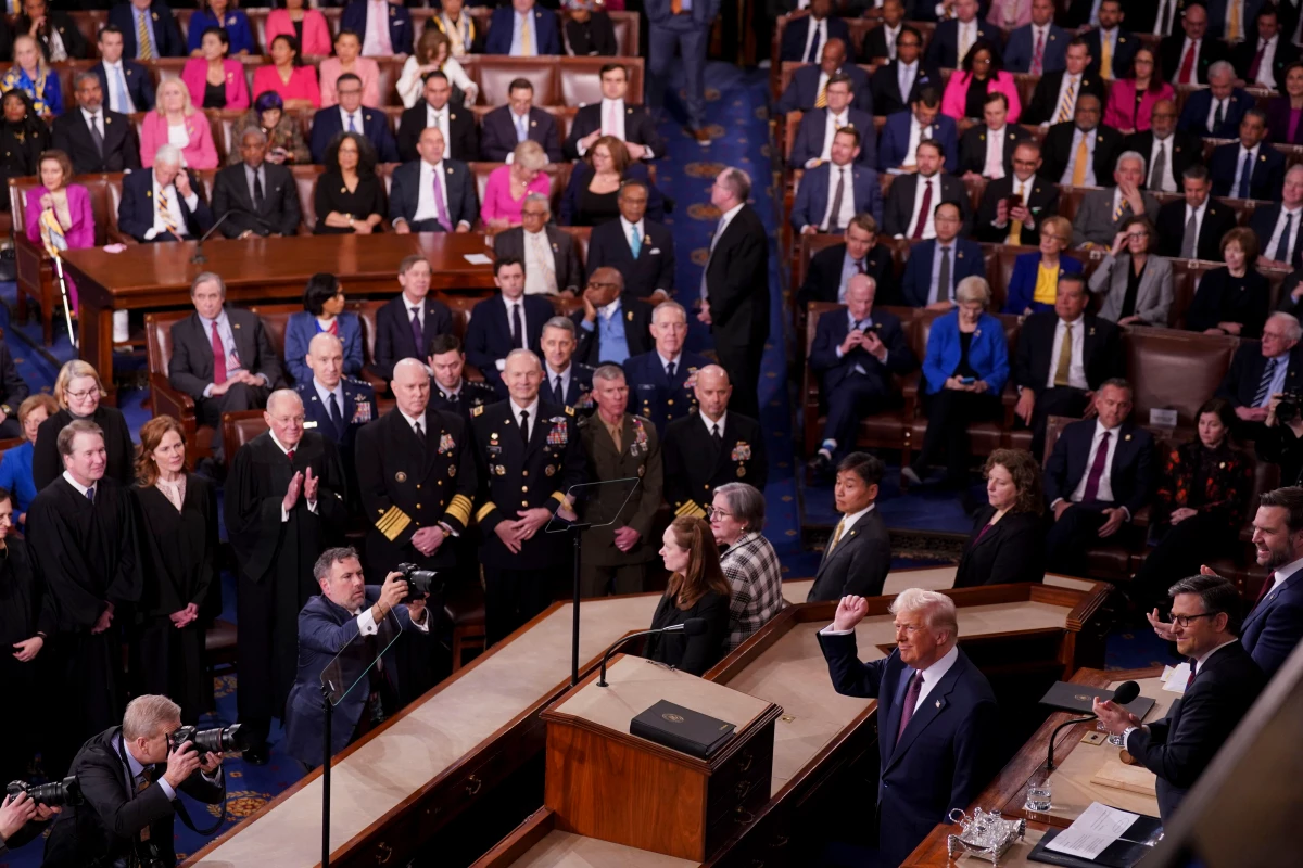 President Trump arrives for a joint session of Congress in the House Chamber of the Capitol.
