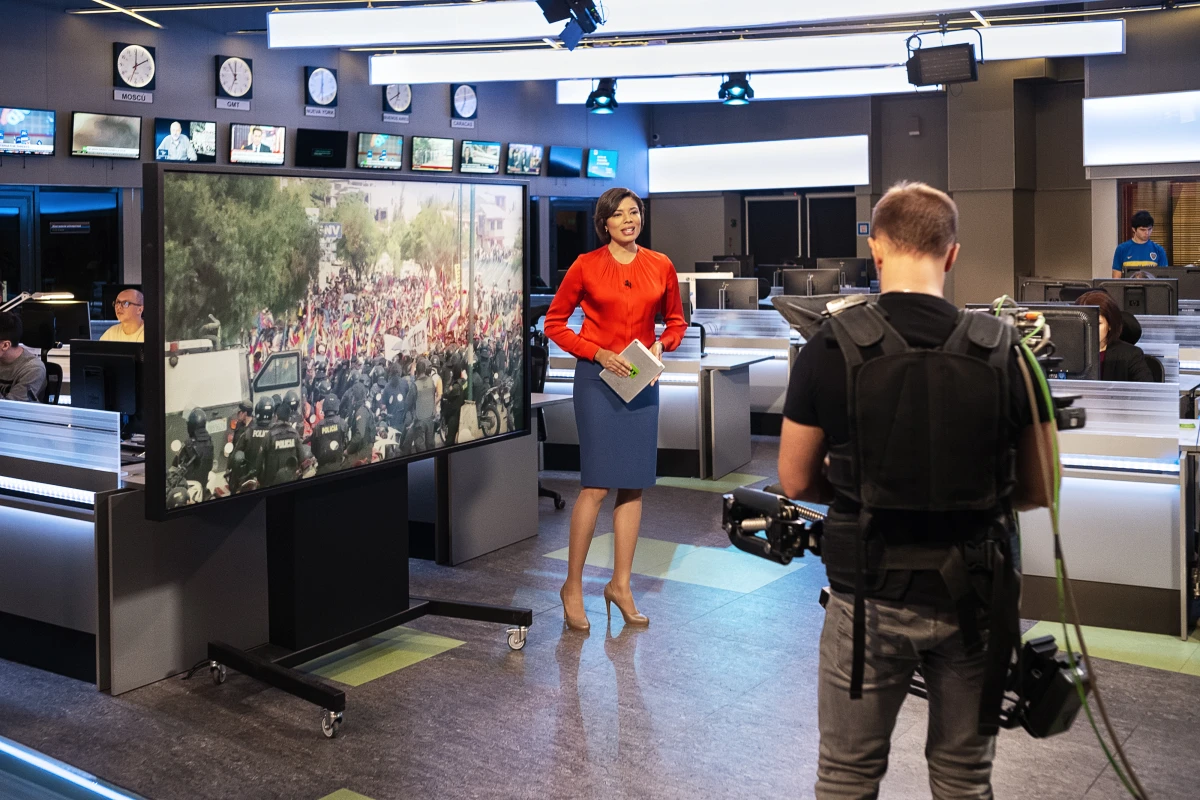 A file photo of RT anchor Aliana Nieves, who was hosting a Spanish-language news program on Dec. 6, 2019 in Moscow. While RT's reach in the U.S. and Europe has been curtailed by sanctions since Russia invaded Ukraine in 2022, the network still has a significant reach in Africa and Latin America.