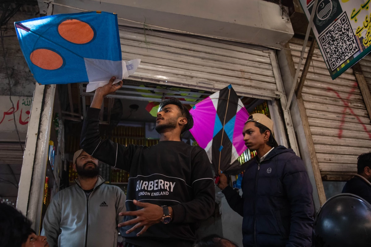 Vendors sell kites in a market area near Mochi Gate ahead of the springtime festival Basant in Lahore, Pakistan. This is the first time in 19 years that the kite festival has been held legally in the city.