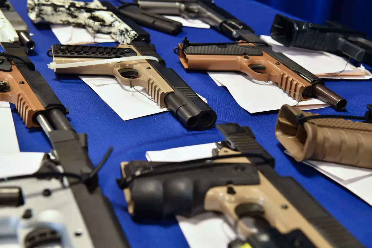 'Ghost guns' seized in federal law enforcement actions are displayed at the Bureau of Alcohol, Tobacco, Firearms and Explosives field office in Glendale, Calif., in April 2022.