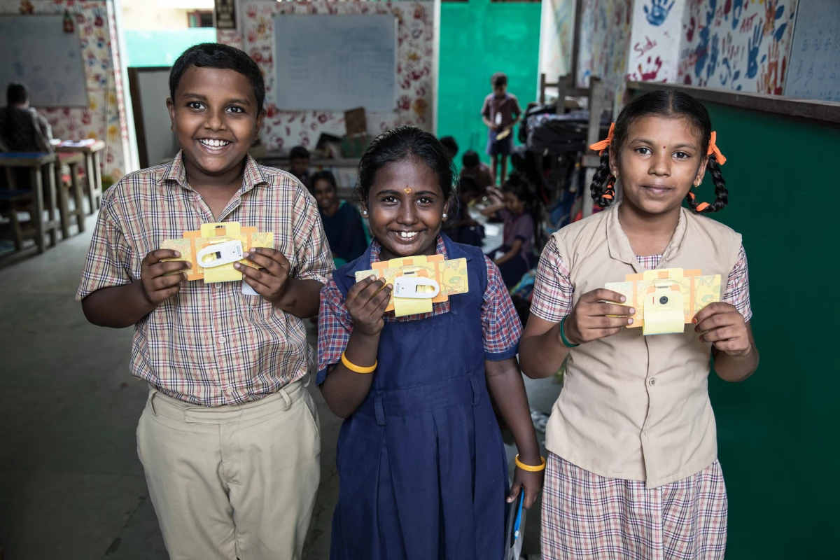 Ramana Rajeesh Kumar, 11, Meenakshi, 8, and Magathi Yazhini, 9, with their Foldscopes. Ramana has been fascinated with bugs for a while. 'They look even cooler under the Foldscope,' he says. 'Especially their eyes and hairy feet!'