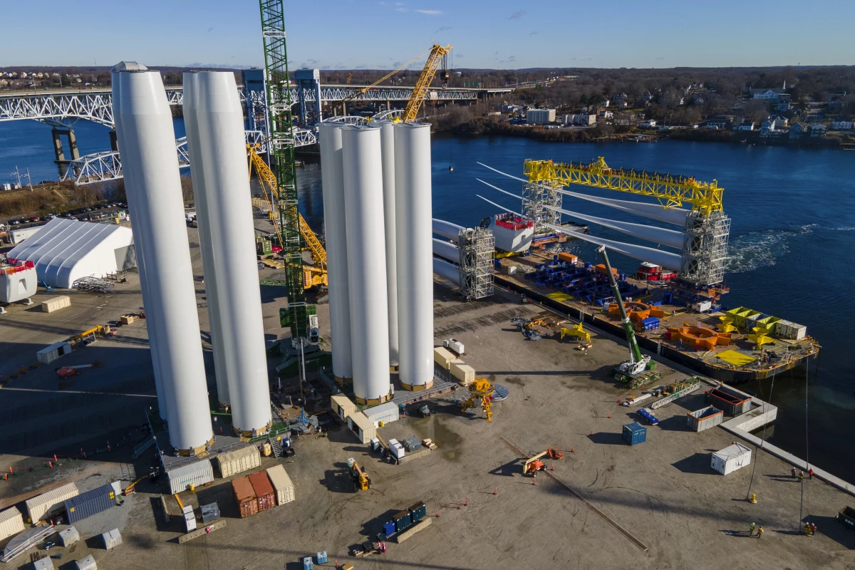 Ports around the country are vying to become hubs for offshore wind farms, like the State Pier in New London, Conn., which is supplying the South Fork Wind farm offshore.