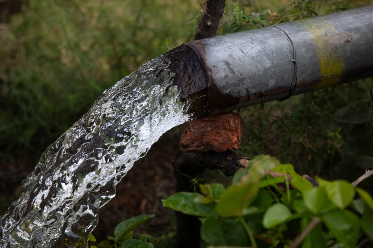 Groundwater flows from a pipe in an agricultural community near the Ravi River, June 6, Lahore, Pakistan.