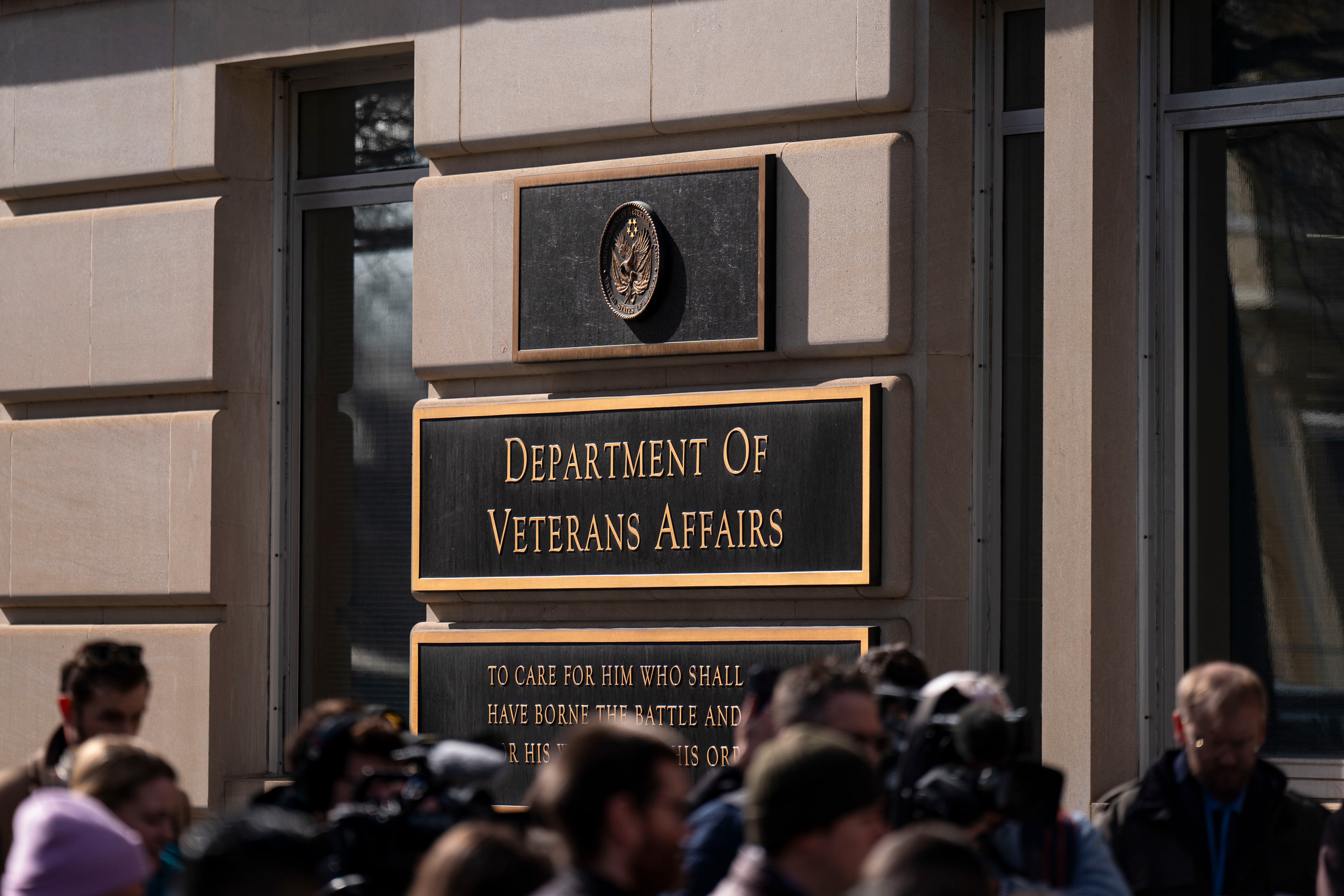 Protestors gathered outside the Department of Veterans Affairs headquarters in Washington, DC, US, on Feb. 13, 2025. The agency plans to cut 80,000 jobs.