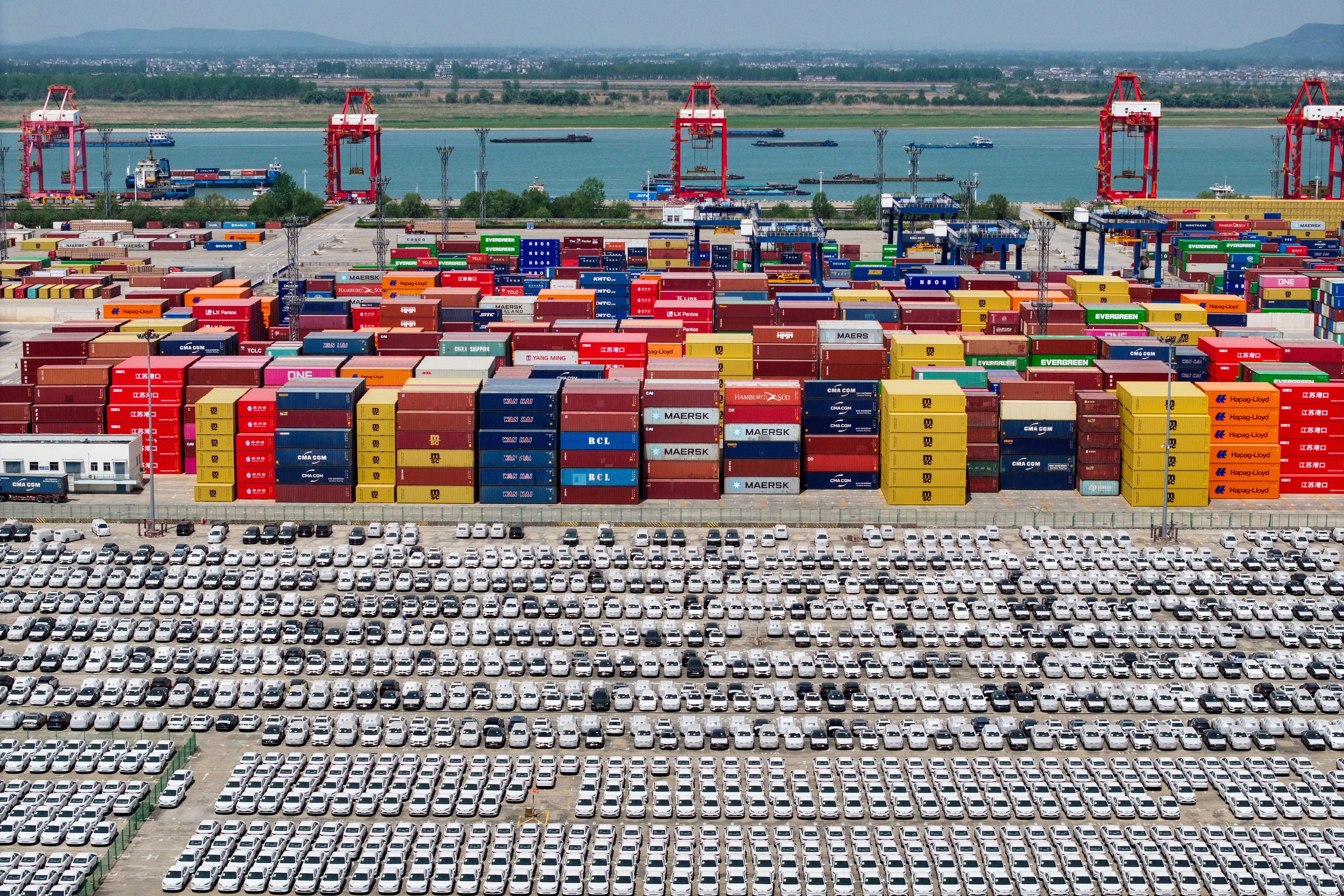 Chinese-made cars are lined up in rows at the port in Nanjing, in China