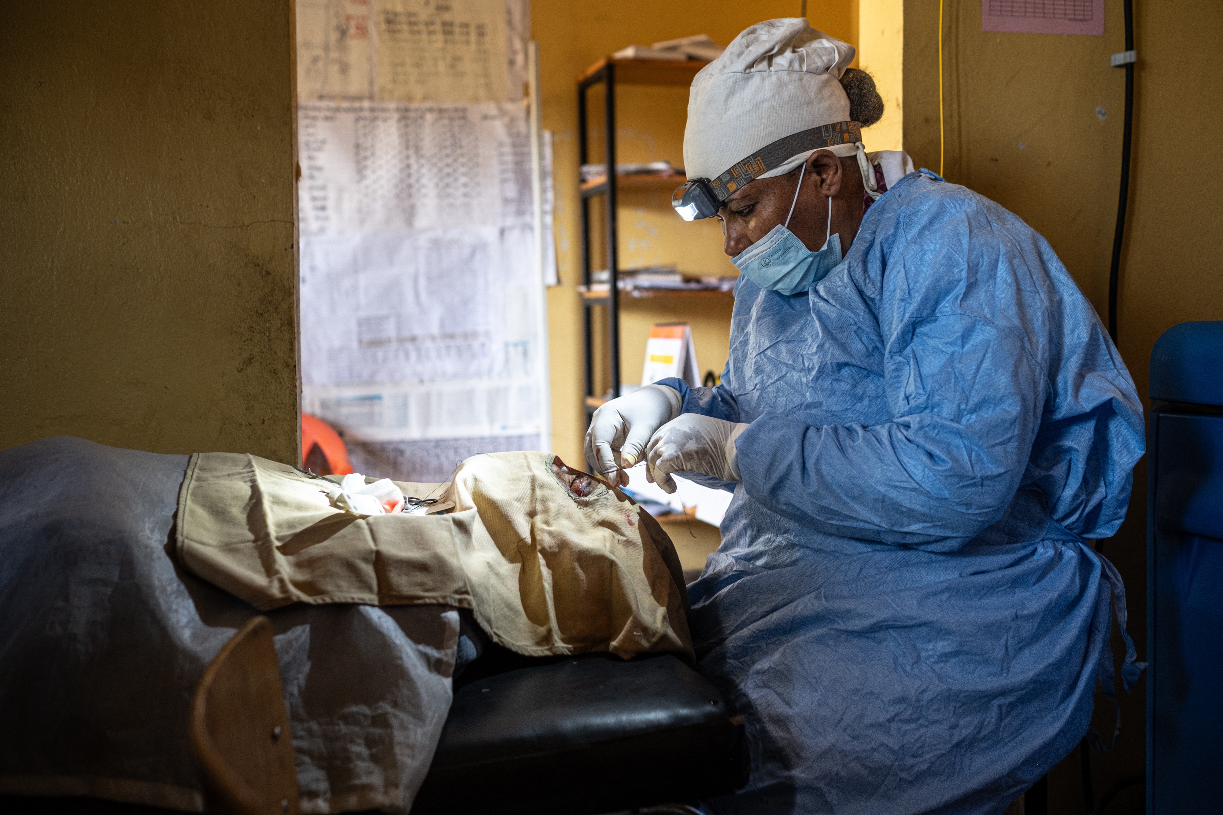 A nurse performs surgery on a trachoma patient in Ethiopia. Trachoma is considered a neglected tropical disease, caused by a bacterial infection, and can lead to blindness.