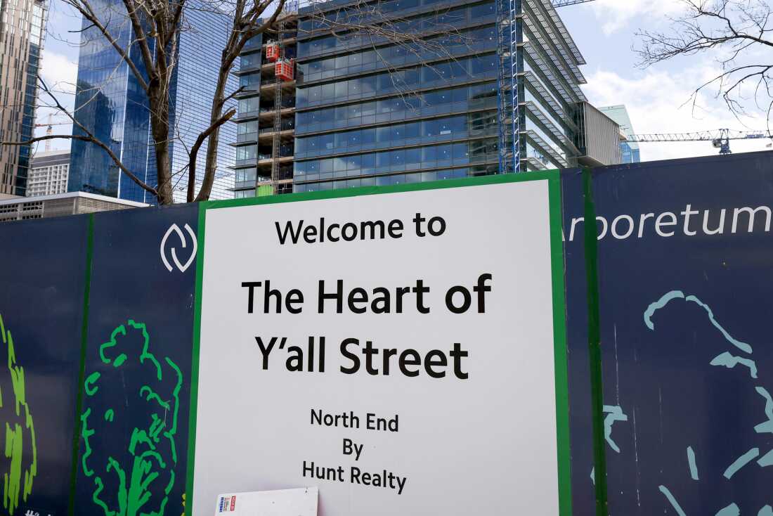 Signage along the construction fence declares the new Goldman Sachs campus as the ‘Heart of Y’all Street’ on Tuesday, March 3, 2026, in Dallas.