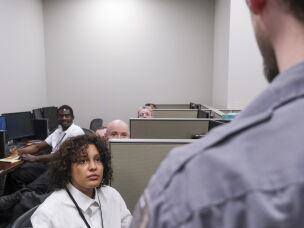 VMD Corp. transportation security officer trainees attend a training session at Kansas City International Airport.