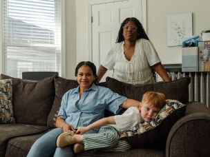 Emani Pike, 14, (left) Marissa and Austin Pike, 4, spend time together in their living room in Massachusetts.