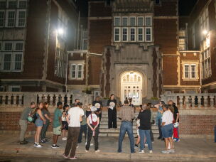 A group gathers for a rat walk in front of the Bruce-Monroe Elementary School in the Park View neighborhood of Washington D.C..
