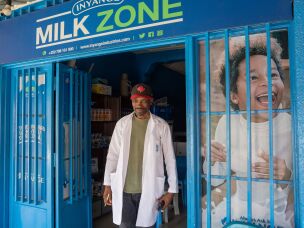 Moses Sansiman has been selling milk at his Milk Zone shop for five years in Kigali, Rwanda.