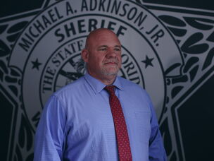 Sheriff Michael Adkinson, in his Walton County office. His office partnered with ICE, and he says he thinks of this cooperation on immigration enforcement as he would any other duty.