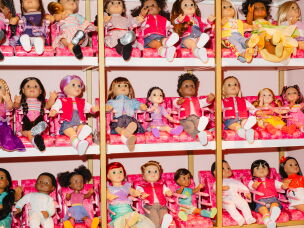 Dolls are displayed in the American Girl café. Hundreds of dolls are sold every day, according to the company.