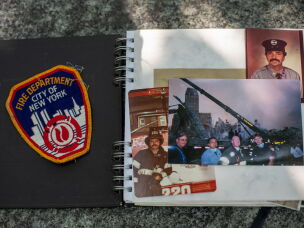 Photographs and a patch that belong to Rocco Fertoli are seen in a family album. Fertoli lost dozens of colleagues and friends on Sept. 11, 2001, and many more have succumbed to illnesses related to the tragedy in the intervening years.
