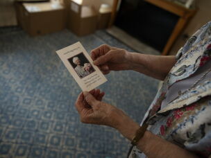 Sister Clare Pratt, 86, holds a photo of Anne Montgomery, the namesake of the community house in Washington, D.C., on July 31, 2026. The home was run by Society of the Sacred Heart, an international congregation of Roman Catholic women, and is closing after a decade.