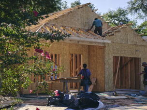 A construction site in Walton County. The vast majority of homes being built in this fast-growing county rely on skilled immigrant labor. Developers say it has become more difficult to find laborers because many are scared of ICE.