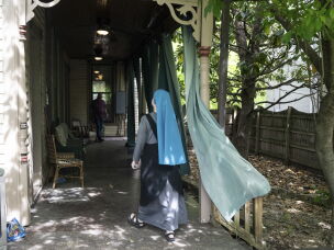 Sister Theresa Alethia explores a potential property for a new convent she wants to open with Sister Danielle Lussier, who call themselves the Sisters of the Little Way of Beauty, Truth and Goodness.
